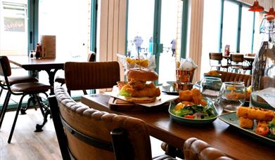 Copperfish dining area with fish and chips