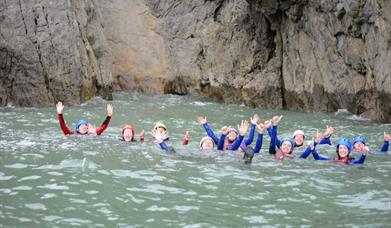 Oxwich Watersports group in water