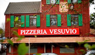 Pizzeria Vesuvio exterior with entrance sign