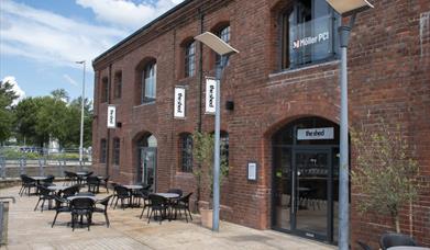 The Shed entrance and outdoor seating