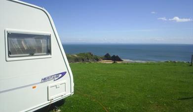 Three cliffs bay holiday park caravan on coastline
