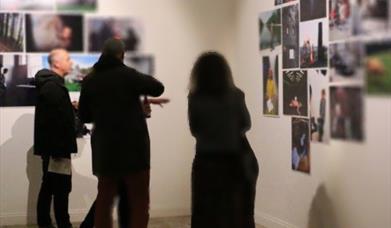 Volcano Theatre customers exploring gallery