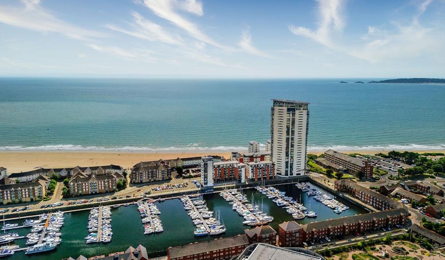 Swansea Bay drone above arena towards marina and bay