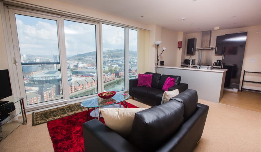 Baystays sofa and living room looking out over marina