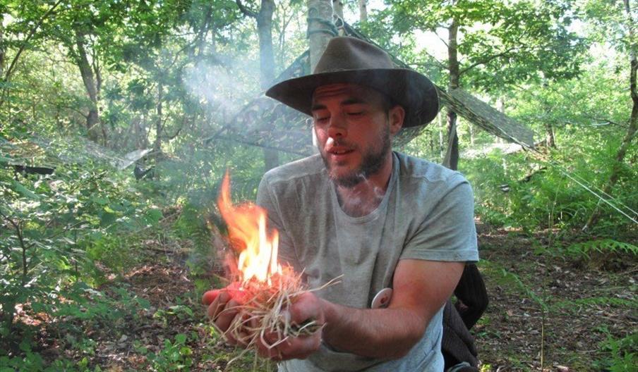 Dryad Bushcraft man making fire