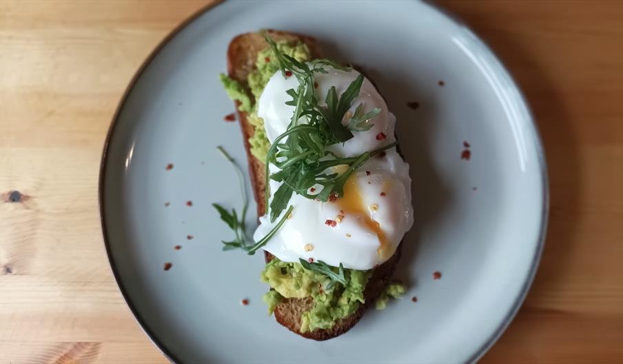 Avocado with poached eggs