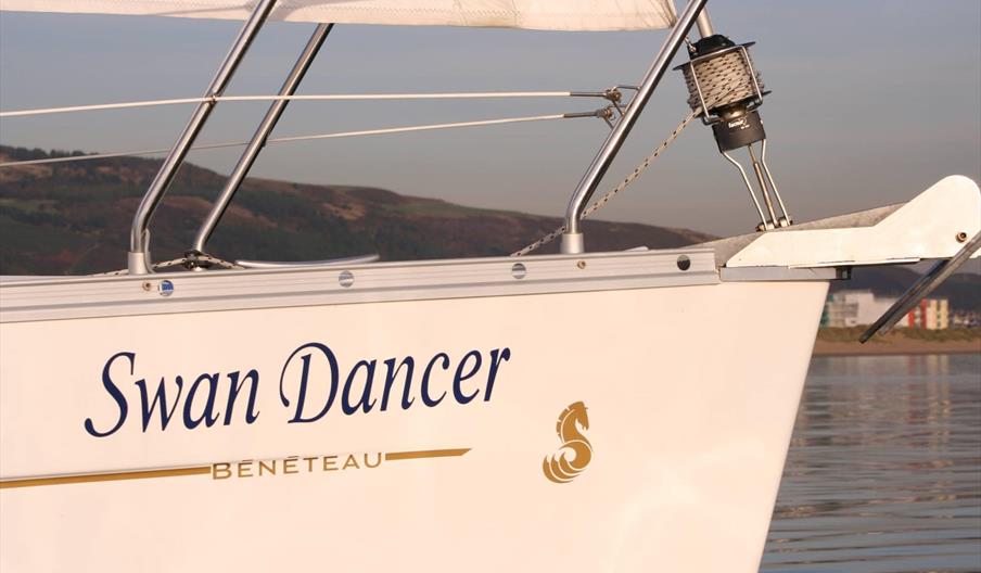 The yacht Swan Dancer sailing in Swansea Bay