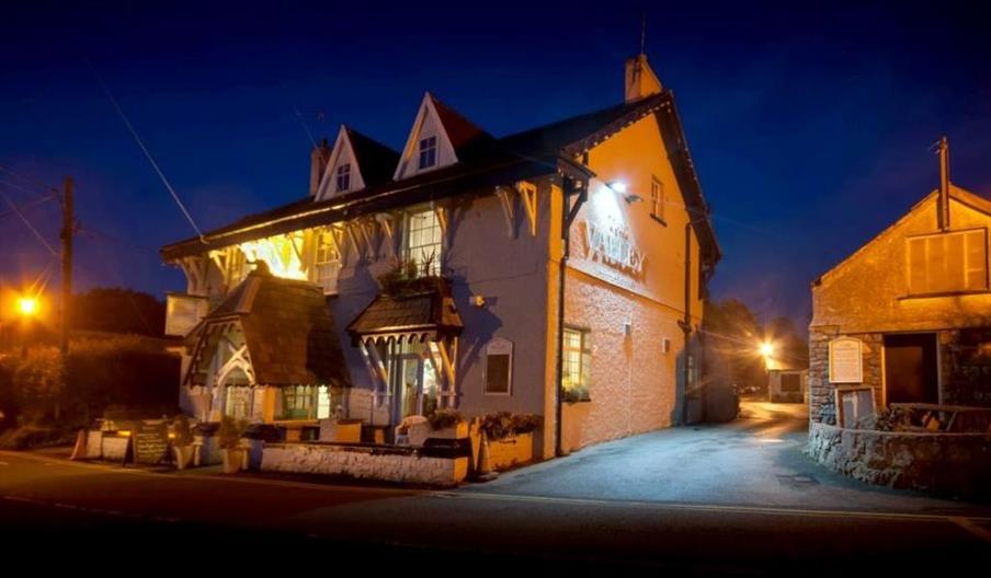 The New Valley exterior at night