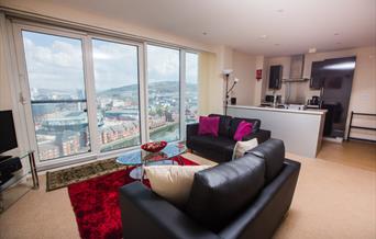 Baystays sofa and living room looking out over marina