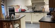 A kitchen inside one of the Gower Country Cottages