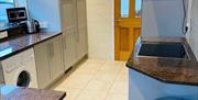 A kitchen in one of the Gower Coast Holiday Homes