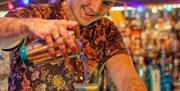 Bambu Beach Bar bartender making cocktails