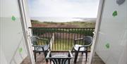 Croft Acre Holiday Cottages balcony with view