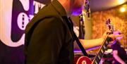 Cu Mumbles musician on stage