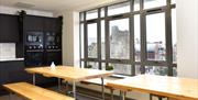 Cwtsh Hostel dining area with view
