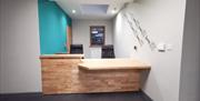 Cwtsh Hostel reception desk