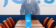 Joes Ice Cream mumbles indoor seating area with picture of joe