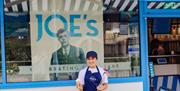 Joes Ice Cream server holding ice cream
