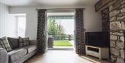 King Arthur Hotel Self Catering living area with patio