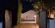 La Petite Maison driveway at night