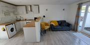 La Petite Maison living room and kitchen area