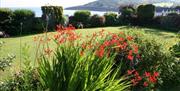 Langland Bay House view of gardens and bay