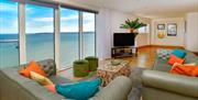 Meridian Quay Apartments living area with sofa and tv