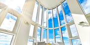 Meridian Quay Apartments panoramic windows with sofa