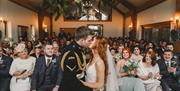 Oldwalls Gower married couple kissing during ceremony