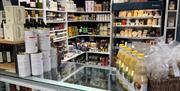 Olives & Oils Delicatessen filled shelves