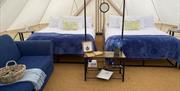Panoramic Camping and Glamping double beds inside tent with sofa