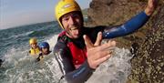 Rip N Rock swimmer smiling at camera