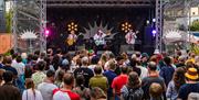 Tŷ Tawe stage with crowd