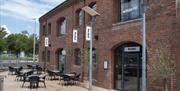 The Shed entrance and outdoor seating