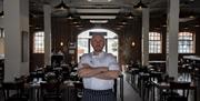 The Shed head chef standing in dining area