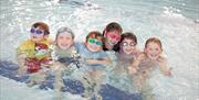 Wales National Pool Swansea group of children smiling