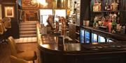 Waterloo Stores bar area with beer pumps