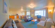 The living and dining area inside one of the units at Gower holiday village