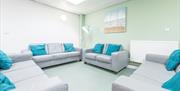 A seating area inside Gower Activity Centre YHA Partner Accommodation