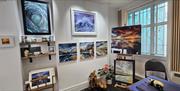 Paintings that capture the beauty of Gower's many beaches and the magnificent sunrises and sunsets